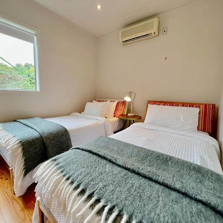 Tawa Cottage - Coast & Country Oneroa Экстерьер фото